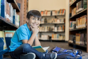 Young boy in library