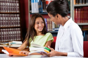 Librarian engaging with student